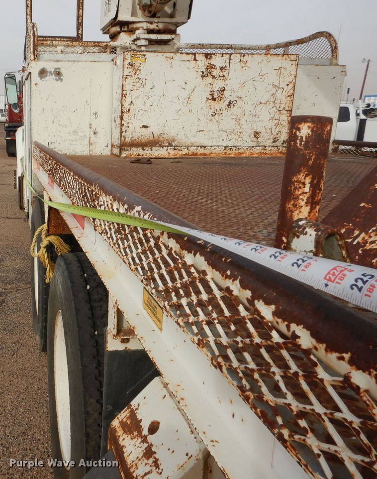 image for item DJ8897 1995 Ford FT900  digger derrick truck