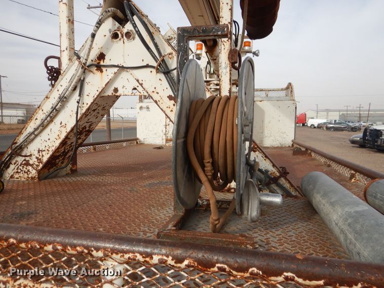 image for item DJ8897 1995 Ford FT900  digger derrick truck