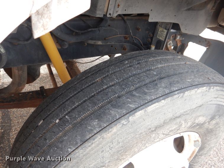 image for item DJ8897 1995 Ford FT900  digger derrick truck