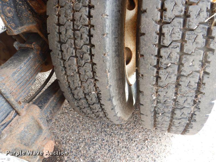 image for item DJ8897 1995 Ford FT900  digger derrick truck