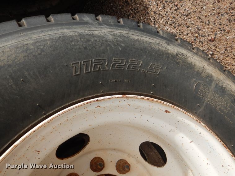 image for item DJ8897 1995 Ford FT900  digger derrick truck