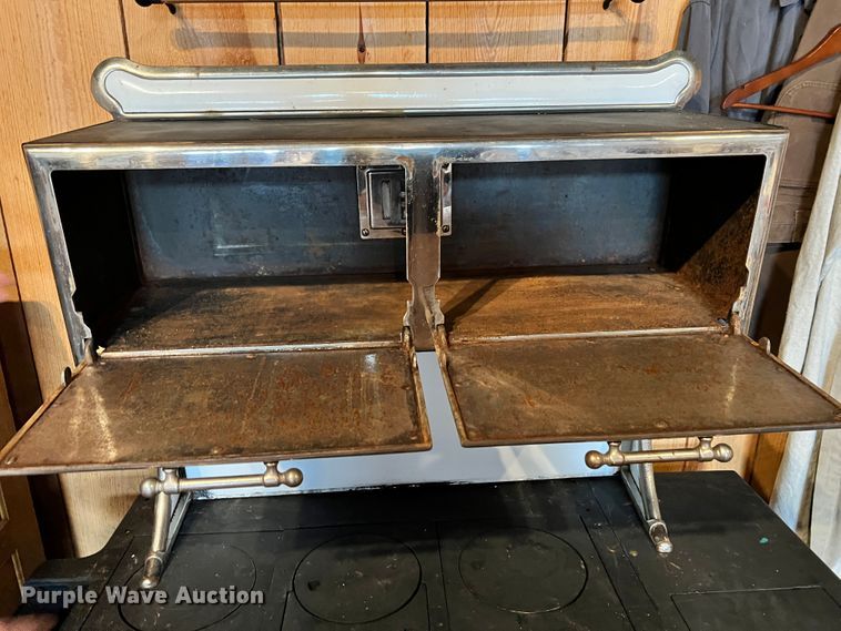 image for item ID9643 Copper Clad  stove