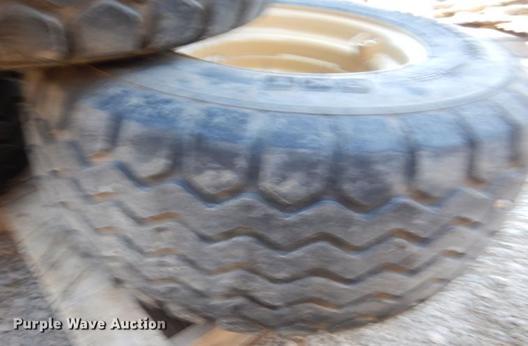 image for item GH9242 (4) BKT AW711 340/60R16.5 tires and wheels