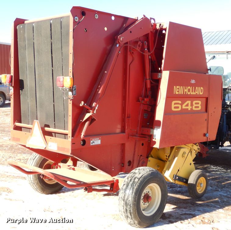 image for item KS9350 1999 New Holland 648  round baler