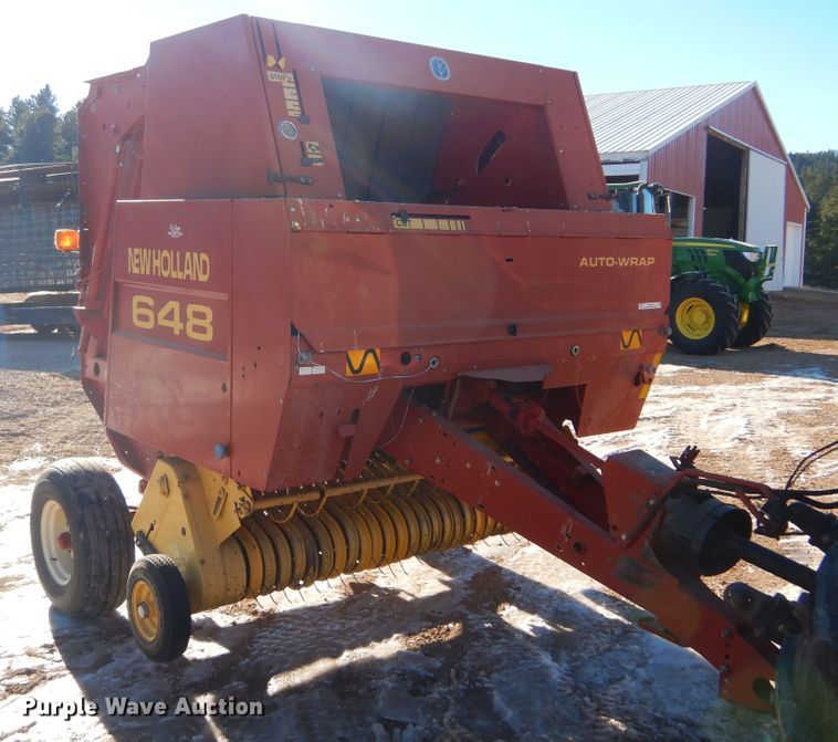 image for item KS9350 1999 New Holland 648  round baler