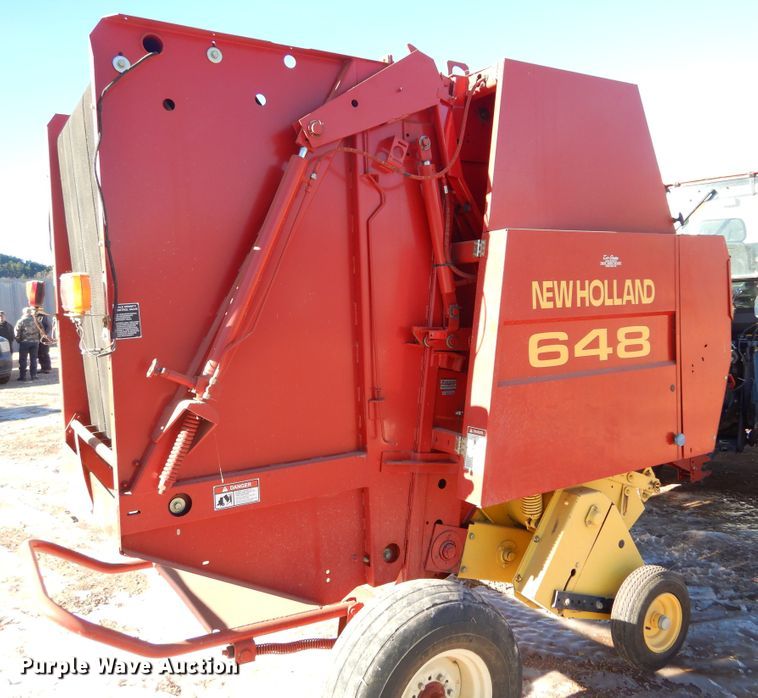 image for item KS9350 1999 New Holland 648  round baler
