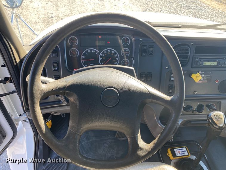 image for item JN9163 2007 Freightliner M2 106  rollback truck