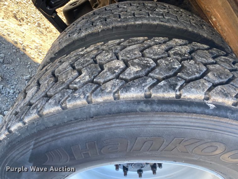 image for item JN9163 2007 Freightliner M2 106  rollback truck