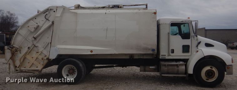 image for item DH8126 2000 Kenworth T300  refuse truck