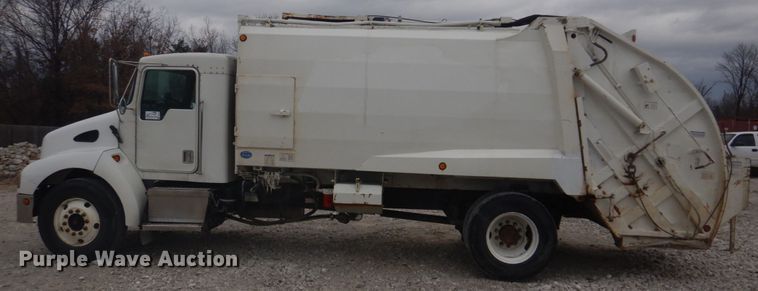image for item DH8126 2000 Kenworth T300  refuse truck