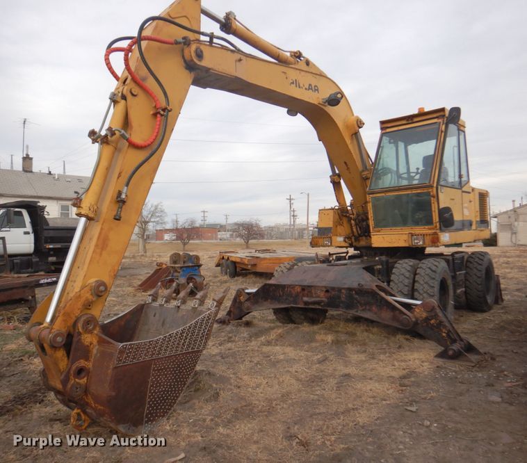 image for item DK8741 1985 Caterpillar 206  wheeled excavator