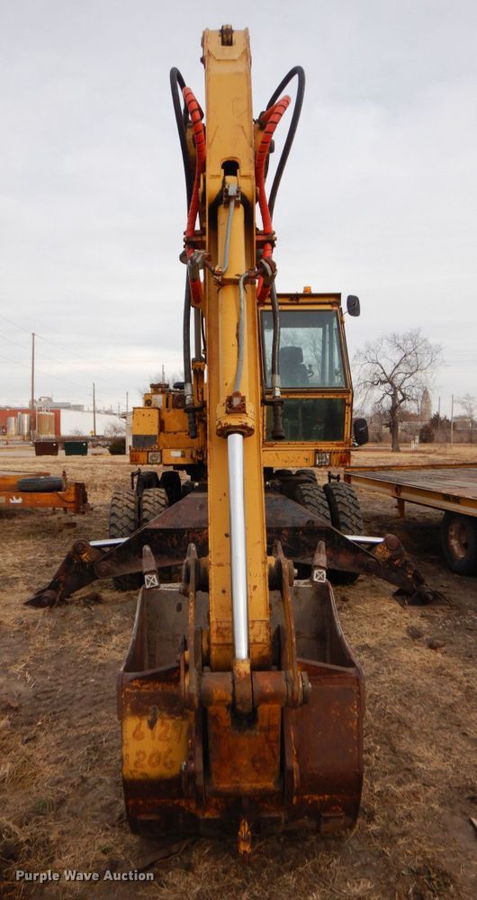 image for item DK8741 1985 Caterpillar 206  wheeled excavator