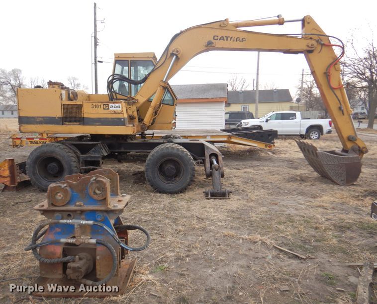 image for item DK8741 1985 Caterpillar 206  wheeled excavator