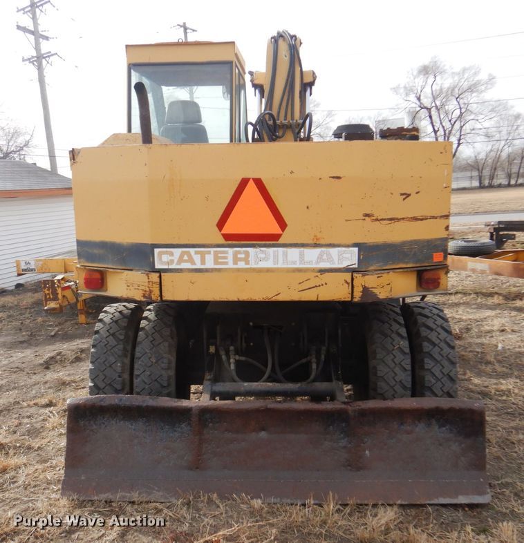 image for item DK8741 1985 Caterpillar 206  wheeled excavator