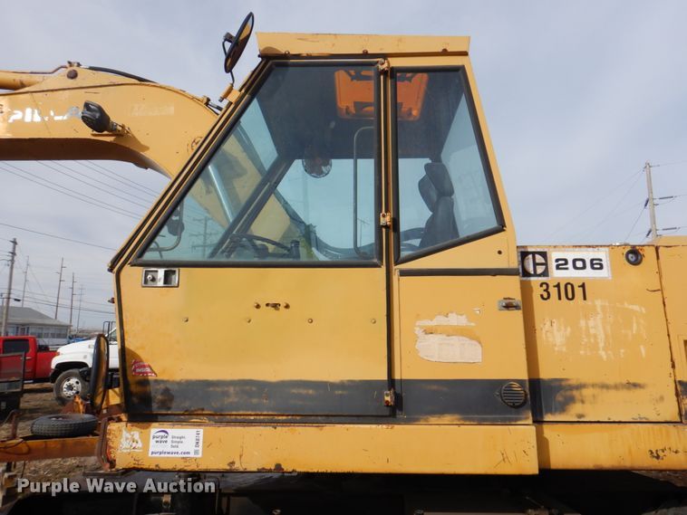 image for item DK8741 1985 Caterpillar 206  wheeled excavator