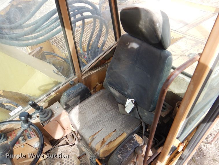 image for item DK8741 1985 Caterpillar 206  wheeled excavator