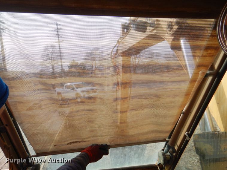 image for item DK8741 1985 Caterpillar 206  wheeled excavator