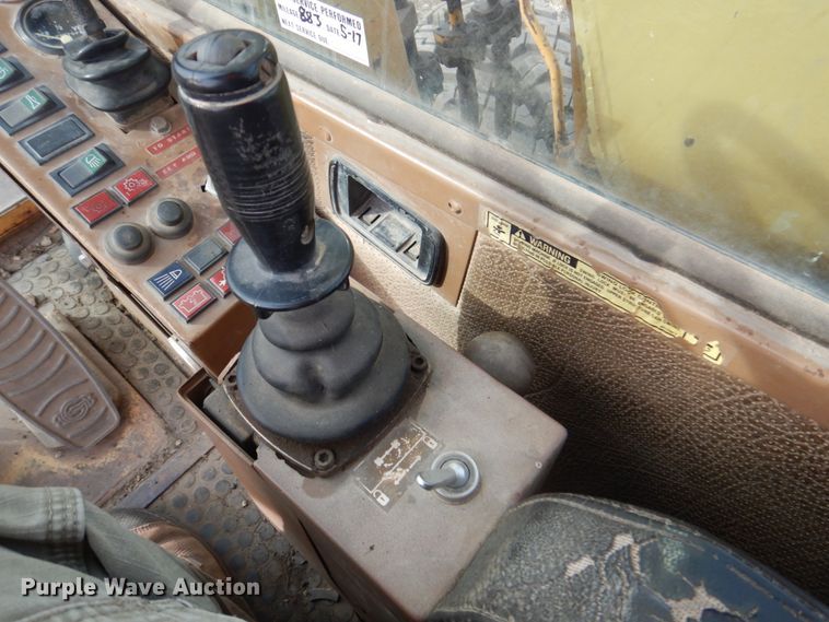 image for item DK8741 1985 Caterpillar 206  wheeled excavator