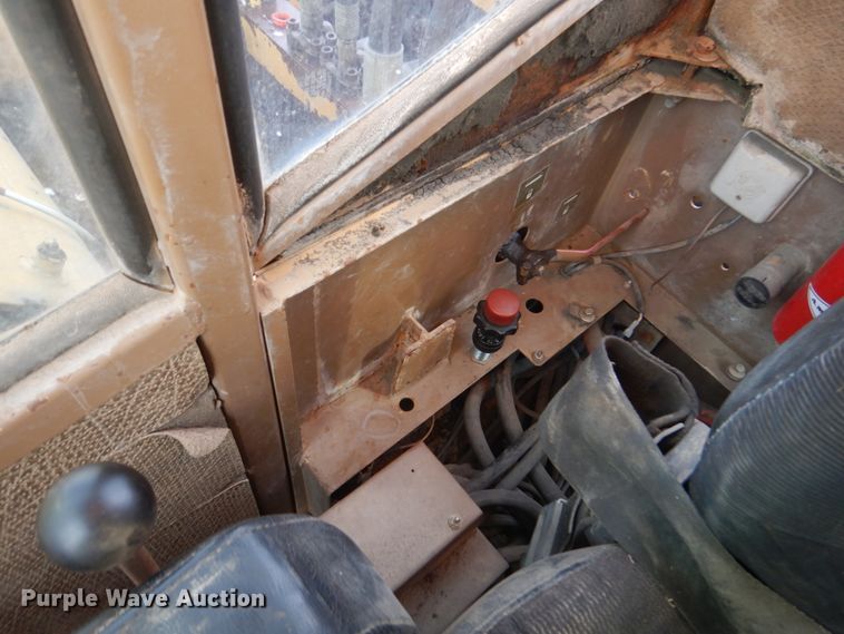 image for item DK8741 1985 Caterpillar 206  wheeled excavator