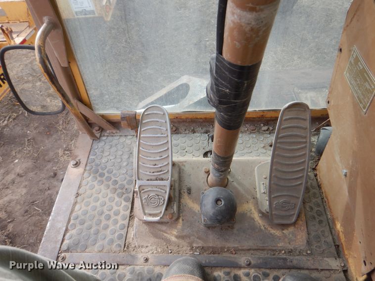 image for item DK8741 1985 Caterpillar 206  wheeled excavator