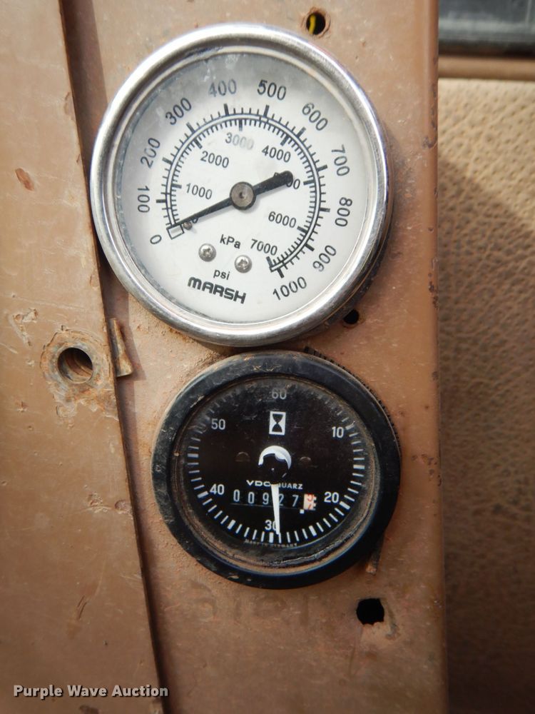 image for item DK8741 1985 Caterpillar 206  wheeled excavator