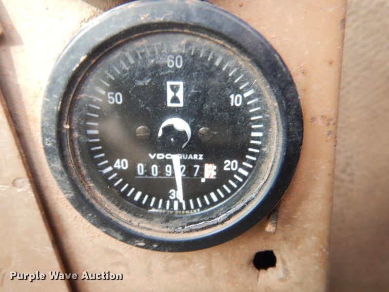 image for item DK8741 1985 Caterpillar 206  wheeled excavator