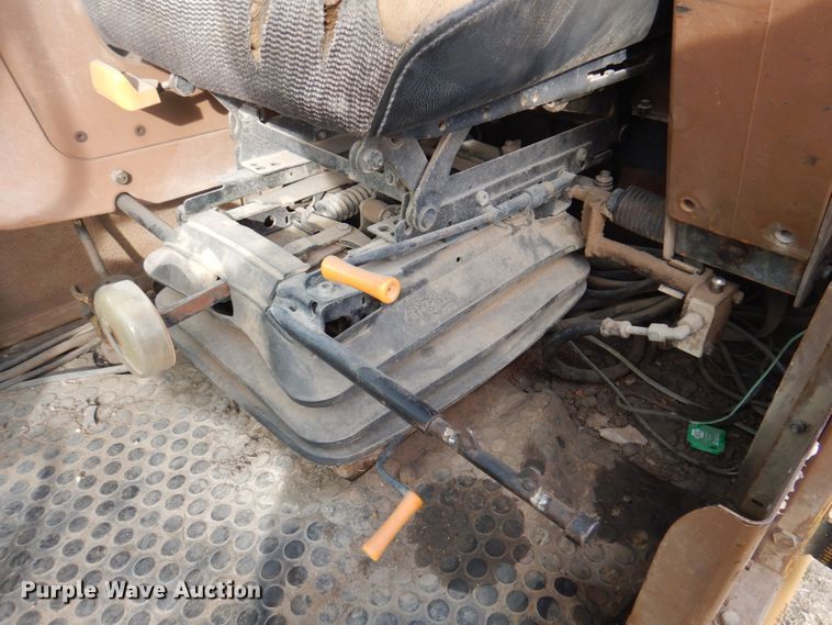 image for item DK8741 1985 Caterpillar 206  wheeled excavator