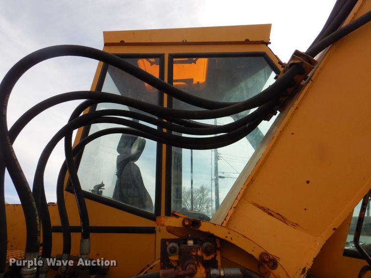 image for item DK8741 1985 Caterpillar 206  wheeled excavator