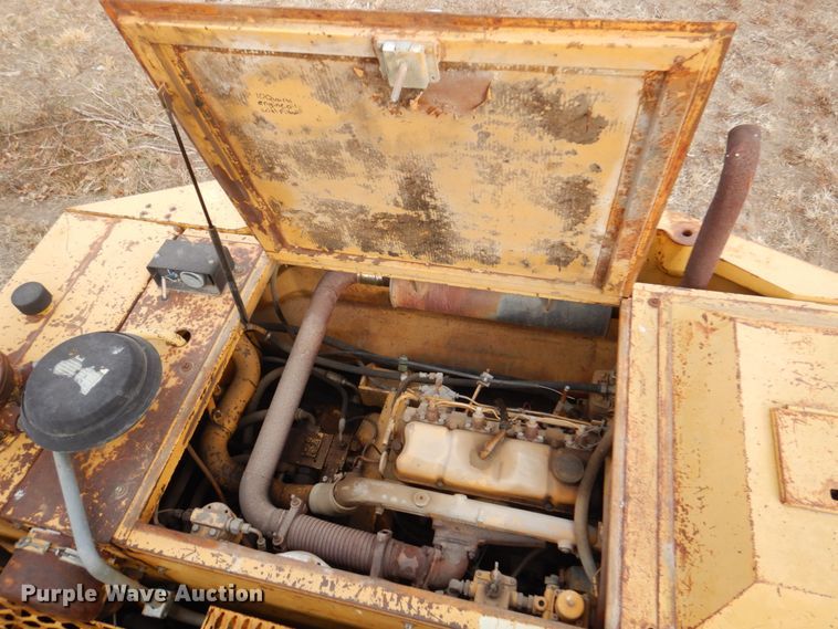 image for item DK8741 1985 Caterpillar 206  wheeled excavator