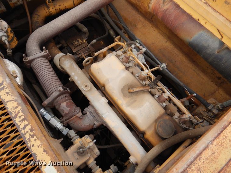 image for item DK8741 1985 Caterpillar 206  wheeled excavator