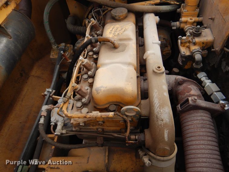 image for item DK8741 1985 Caterpillar 206  wheeled excavator