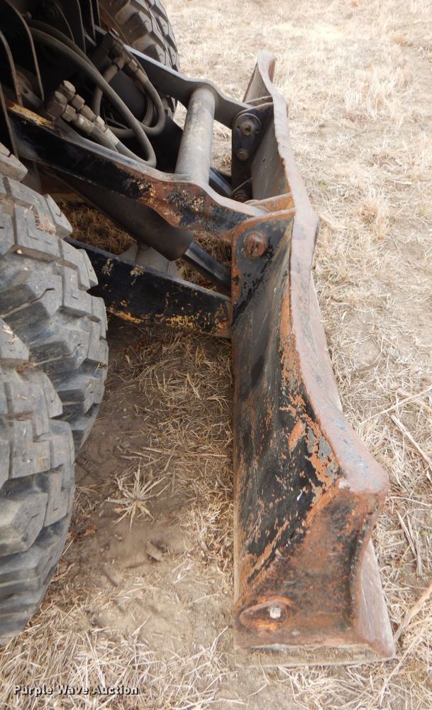 image for item DK8741 1985 Caterpillar 206  wheeled excavator