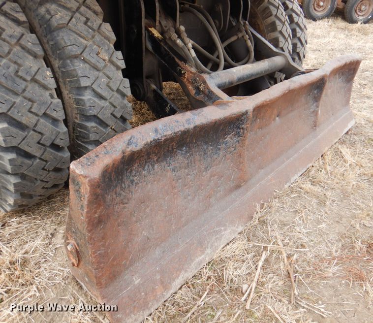 image for item DK8741 1985 Caterpillar 206  wheeled excavator