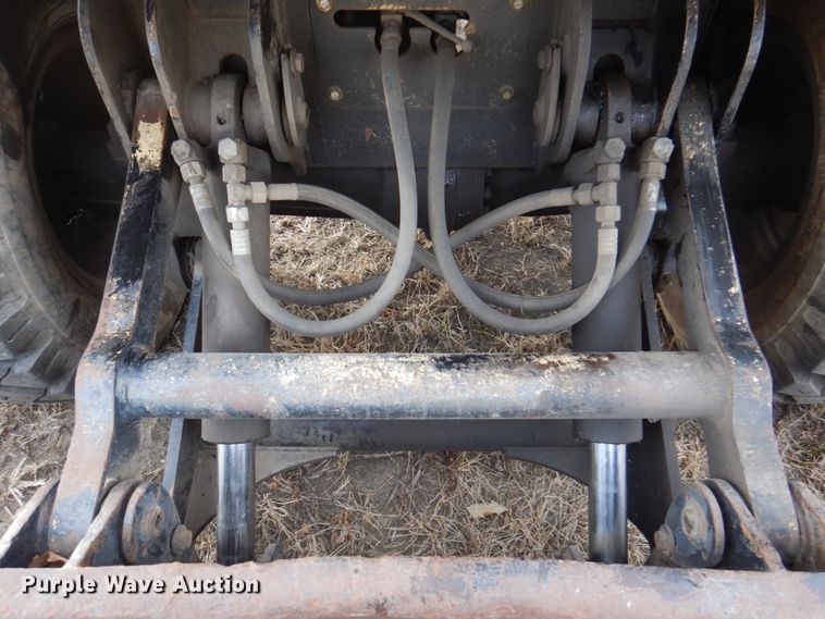 image for item DK8741 1985 Caterpillar 206  wheeled excavator