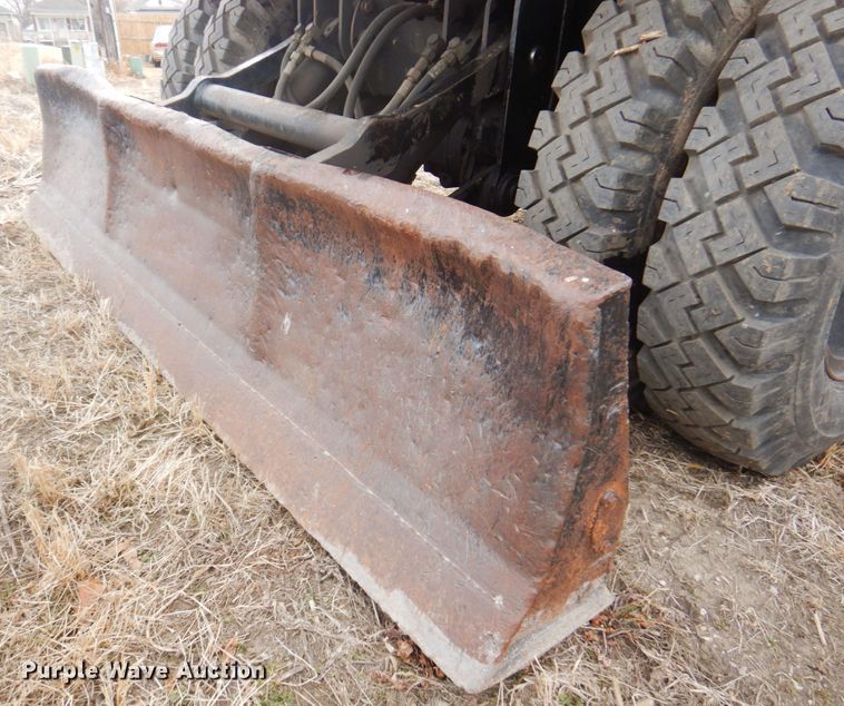 image for item DK8741 1985 Caterpillar 206  wheeled excavator