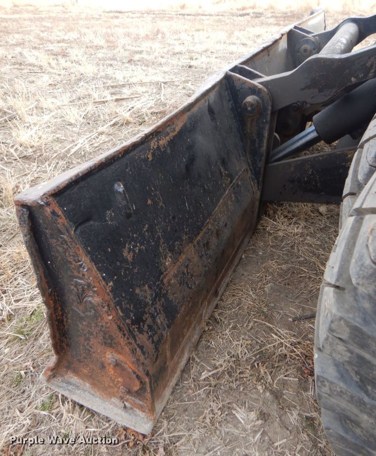 image for item DK8741 1985 Caterpillar 206  wheeled excavator