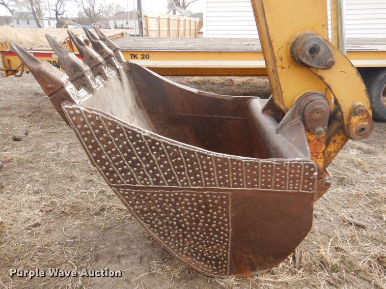 image for item DK8741 1985 Caterpillar 206  wheeled excavator