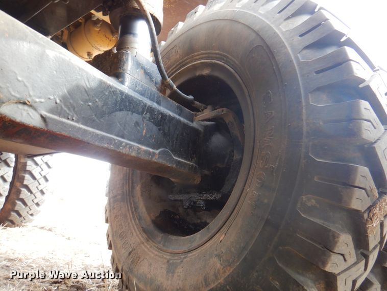 image for item DK8741 1985 Caterpillar 206  wheeled excavator