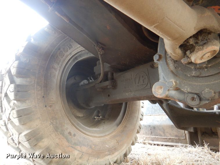 image for item DK8741 1985 Caterpillar 206  wheeled excavator