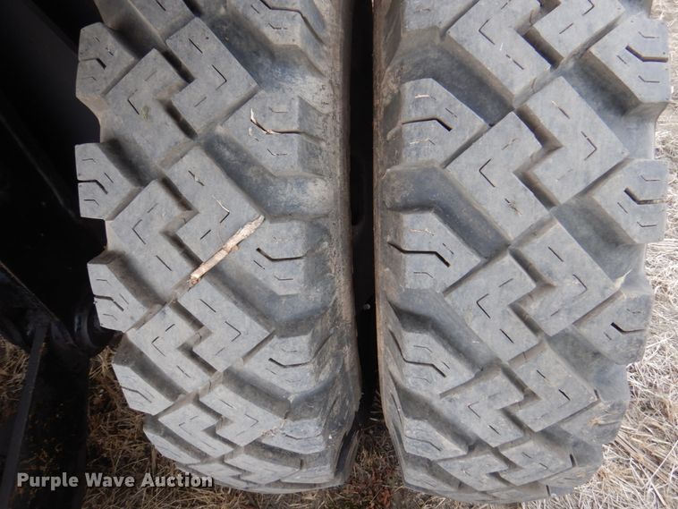 image for item DK8741 1985 Caterpillar 206  wheeled excavator