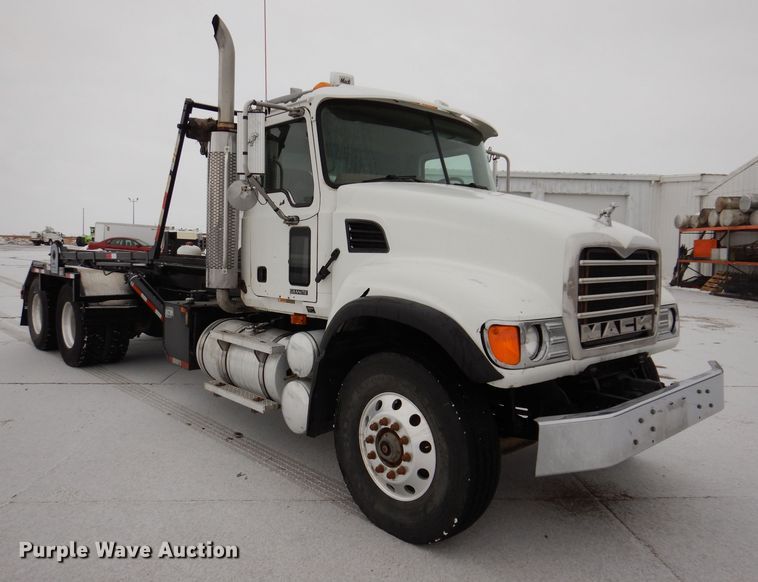 image for item JH9919 2004 Mack Granite CV700  roll-off container truck