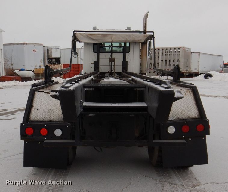 image for item JH9919 2004 Mack Granite CV700  roll-off container truck