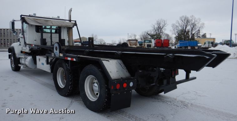 image for item JH9919 2004 Mack Granite CV700  roll-off container truck