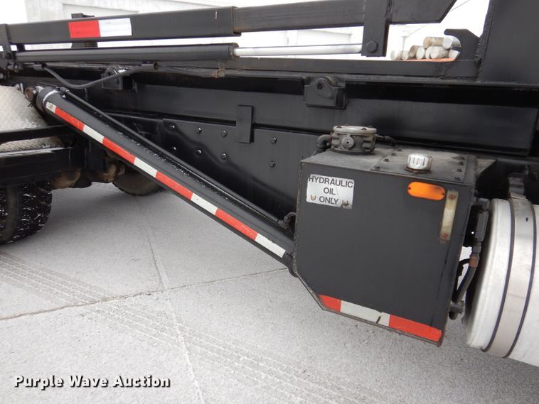 image for item JH9919 2004 Mack Granite CV700  roll-off container truck