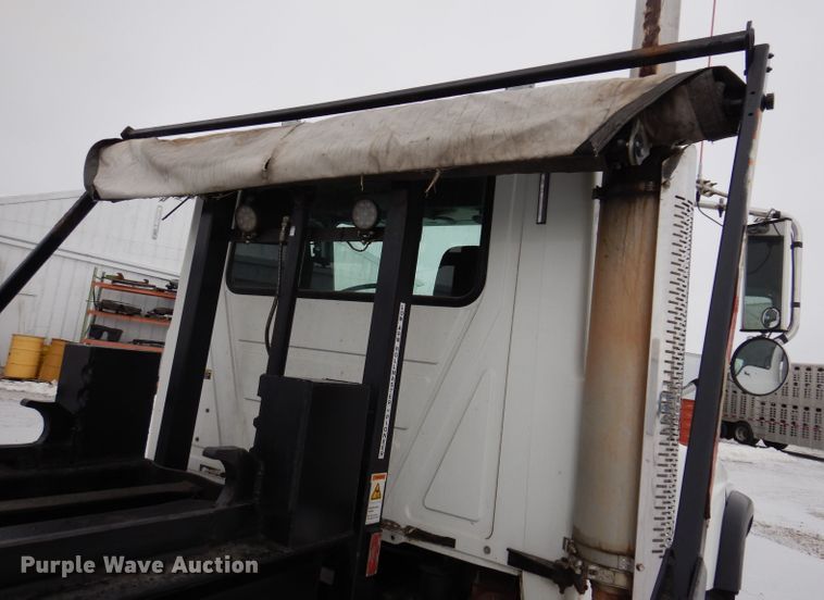 image for item JH9919 2004 Mack Granite CV700  roll-off container truck