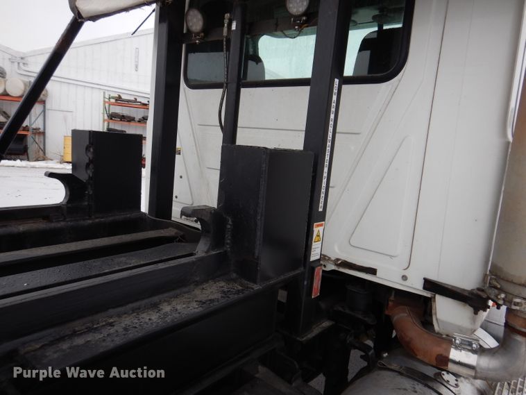 image for item JH9919 2004 Mack Granite CV700  roll-off container truck