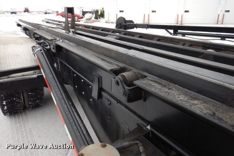 image for item JH9919 2004 Mack Granite CV700  roll-off container truck