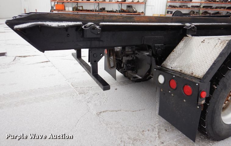 image for item JH9919 2004 Mack Granite CV700  roll-off container truck