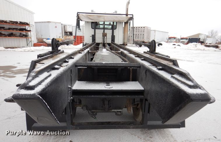 image for item JH9919 2004 Mack Granite CV700  roll-off container truck