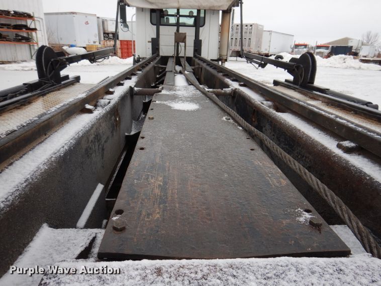 image for item JH9919 2004 Mack Granite CV700  roll-off container truck